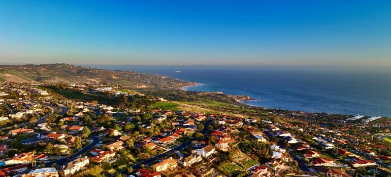Palos Verdes Estates stands out for its stunning natural beauty and luxurious homes, attracting those exploring family-friendly towns near Los Angeles with scenic views in a high-end community