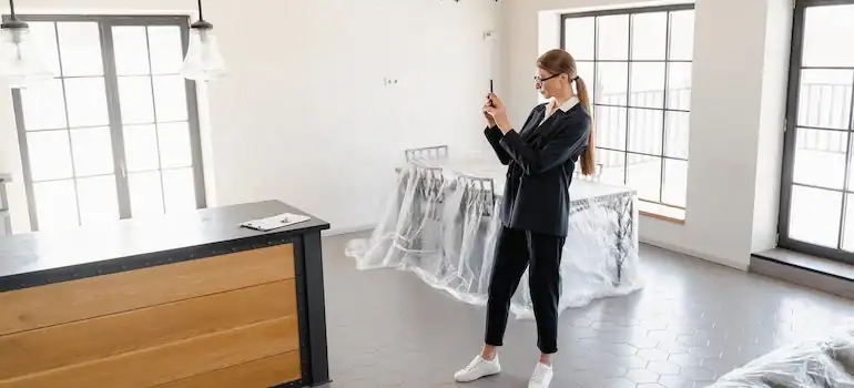 Taking pictures of your belongings is a crucial step in every detailed furniture moving guide.
